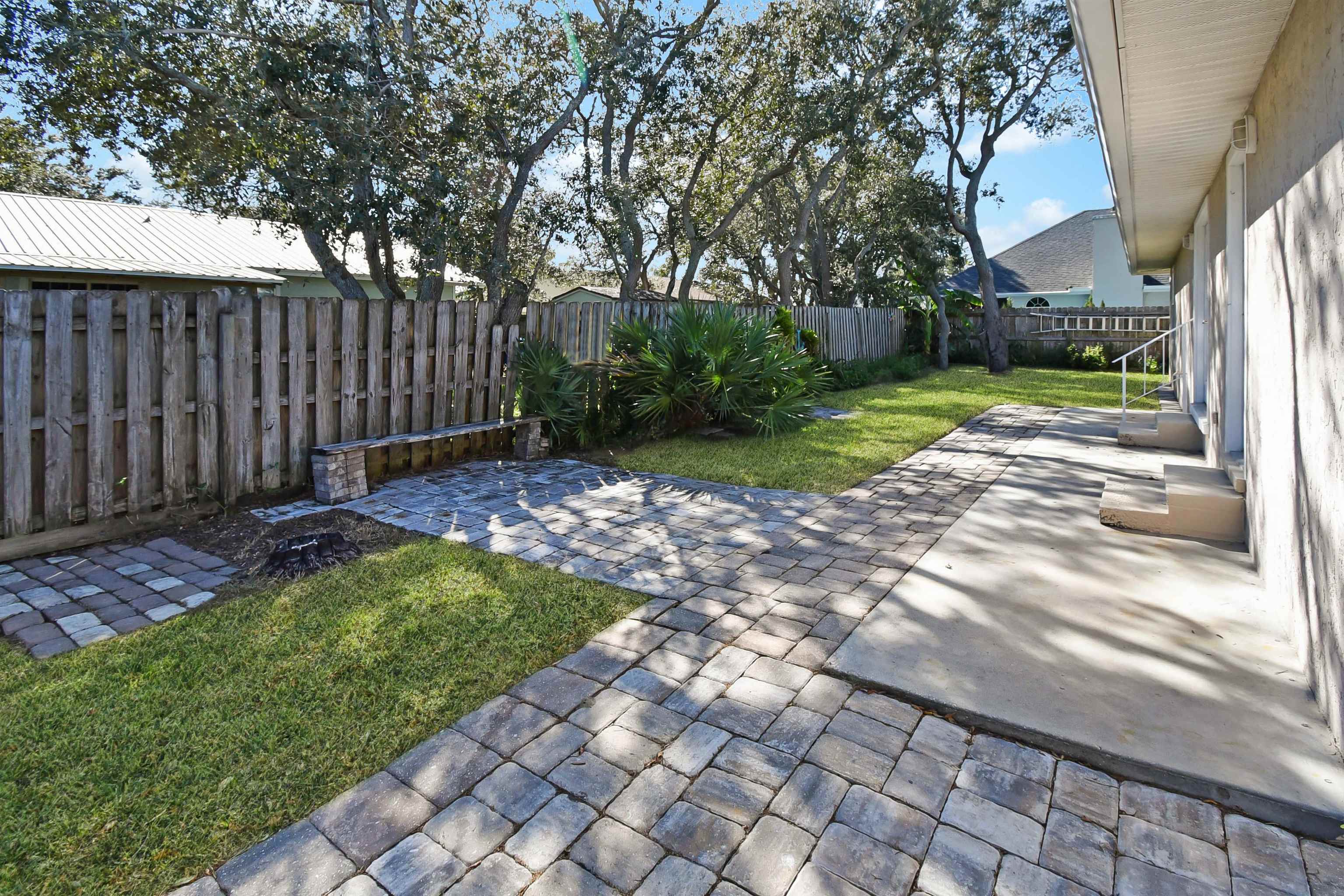 317 Mystical Way St. Augustine, FL 32080 - Photo 18 of 25 Fenced backyard with a patio area