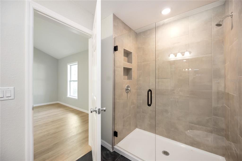 3294 West Price Boulevard North Port, FL 34286 - Photo 20 of 47 a bathroom with a shower and toilet