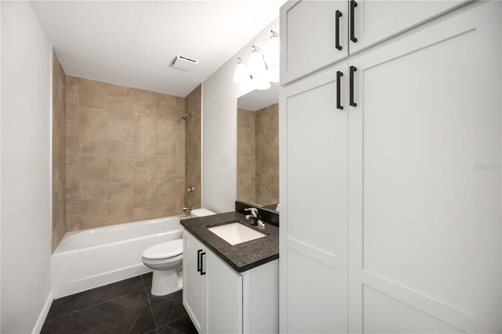 3294 West Price Boulevard North Port, FL 34286 - Photo 29 of 47 a bathroom with a sink and a mirror