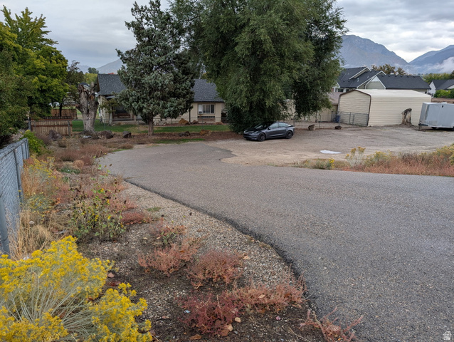 1341 East Crk Road Sandy, UT 84093 - Photo 11 of 24 View of street featuring a mountain view