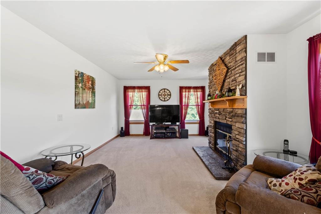 119 Cooper Road Slippery Rock, PA 16057 - Photo 15 of 25 a living room with furniture and a fireplace