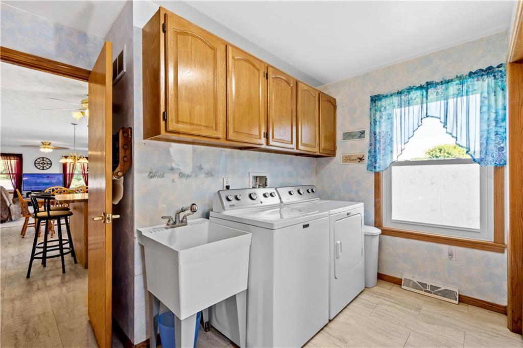 119 Cooper Road Slippery Rock, PA 16057 - Photo 16 of 25 a view of a kitchen with appliances and furniture