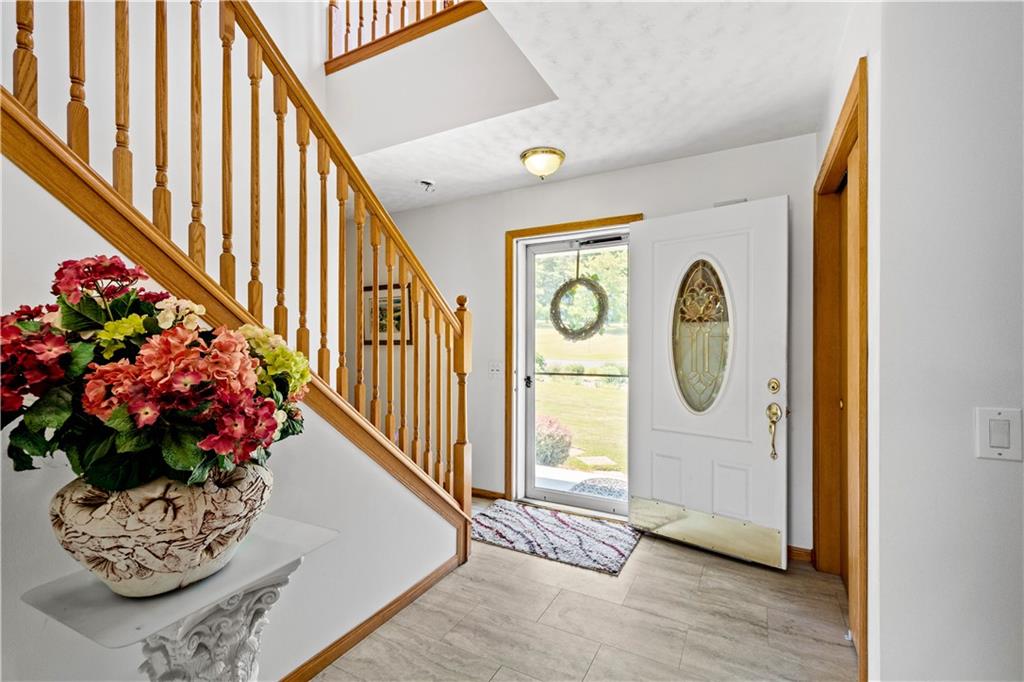 119 Cooper Road Slippery Rock, PA 16057 - Photo 8 of 25 a view of entryway with wooden floor