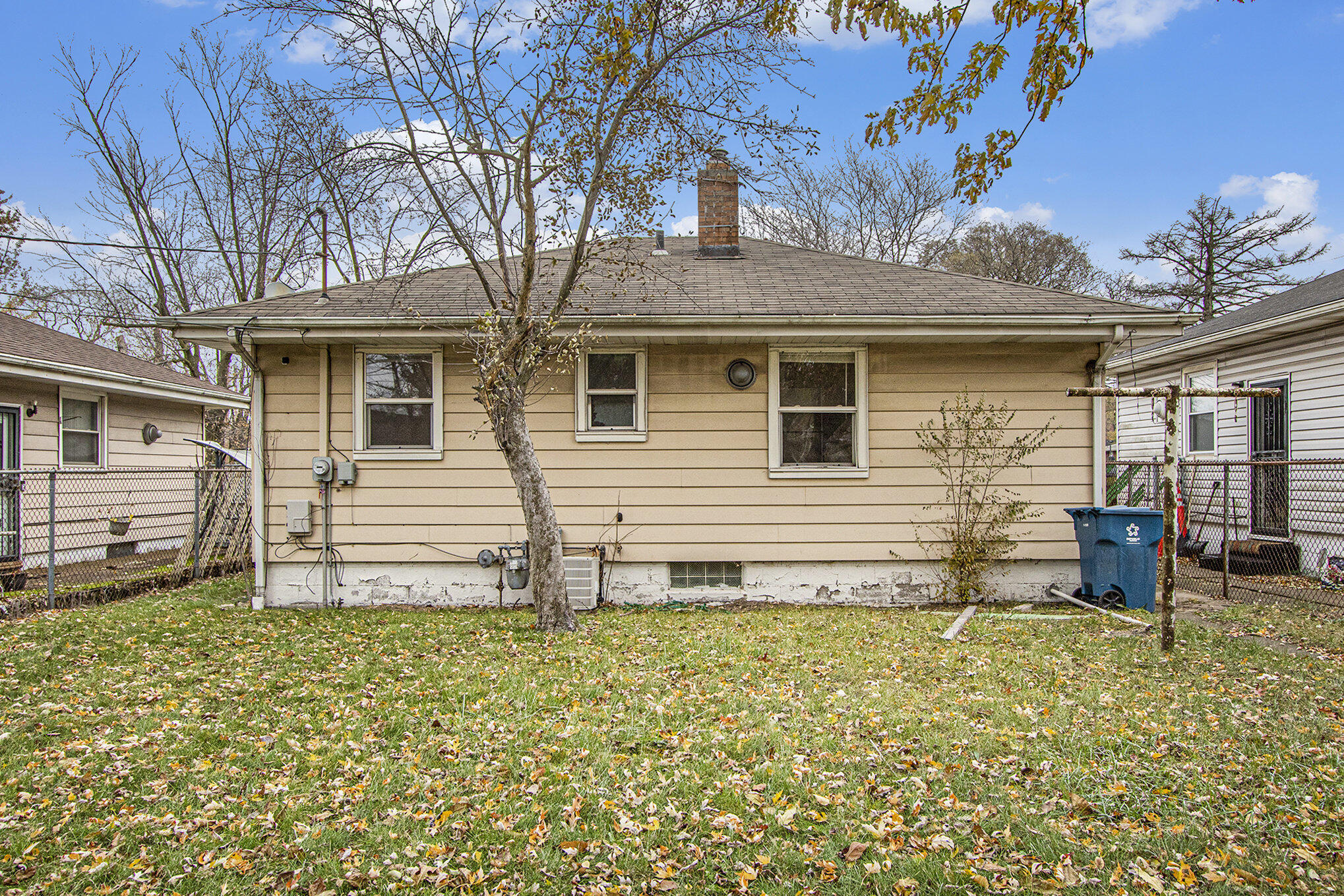 1350 Morton Street Gary, IN 46404 - Photo 15 of 17 a front view of a house with garden
