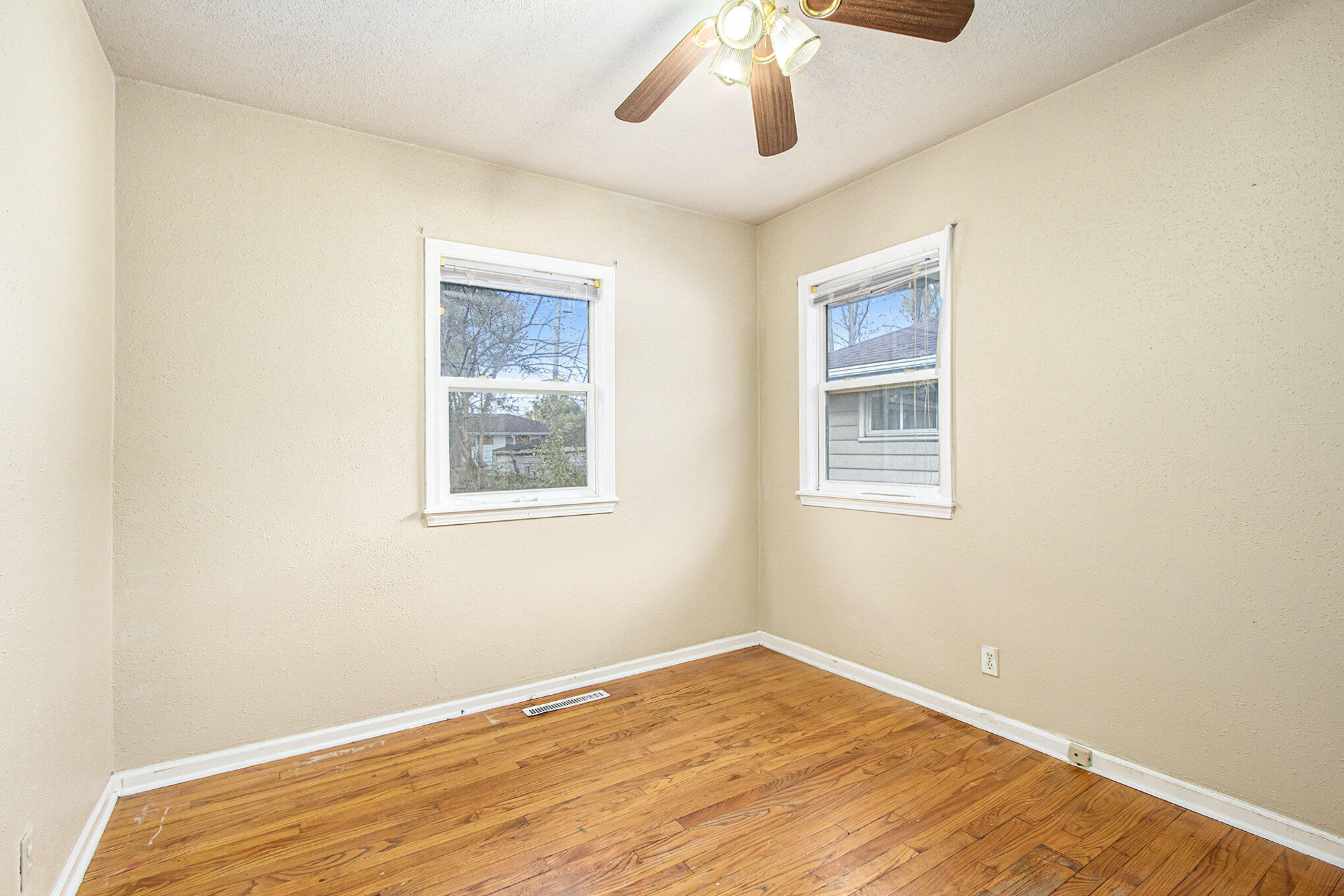1350 Morton Street Gary, IN 46404 - Photo 9 of 17 a view of empty room with wooden floor