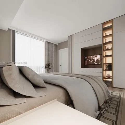 a bedroom with a bed and window