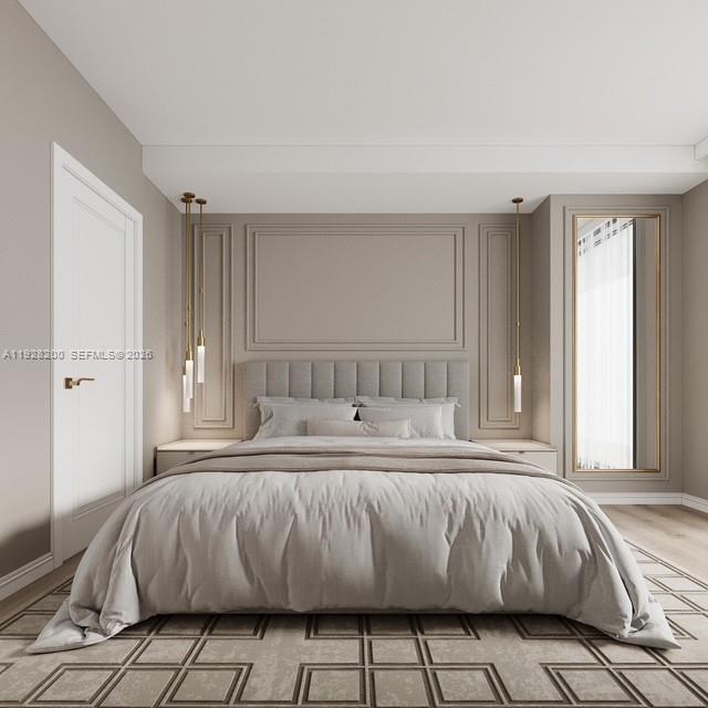 45 Southwest 9th Street, Unit 2303 Miami, FL 33130 - Photo 6 of 33 a living room with a bed and a window