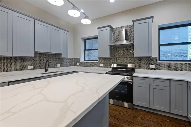 a view of a balcony with wooden floor
