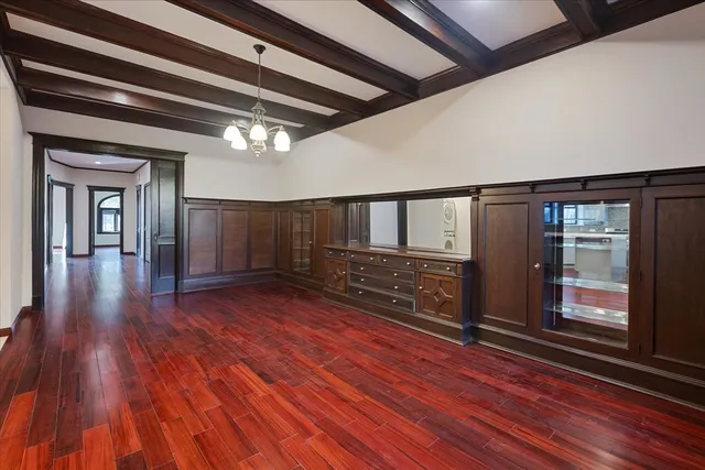 a bathroom with a granite countertop sink mirror and shower