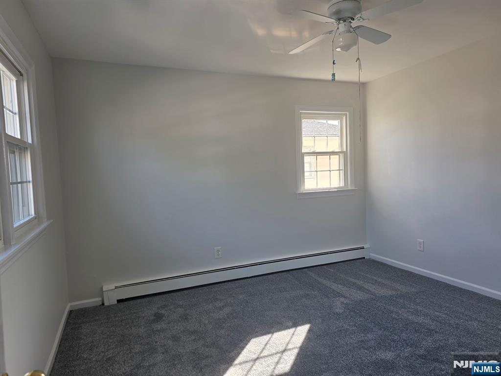 633 10th Street, Unit 2 Lyndhurst, NJ 07071 - Photo 11 of 11 an empty room with a window