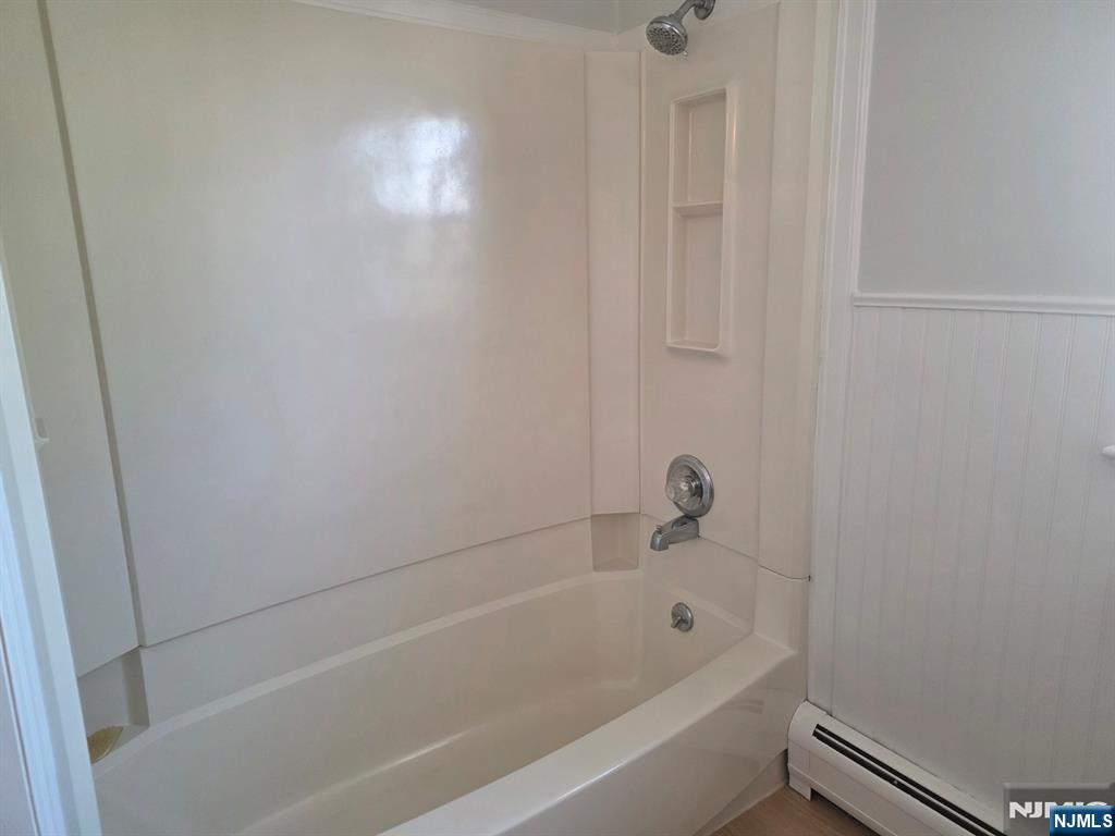 633 10th Street, Unit 2 Lyndhurst, NJ 07071 - Photo 5 of 11 a bathroom with a bathtub
