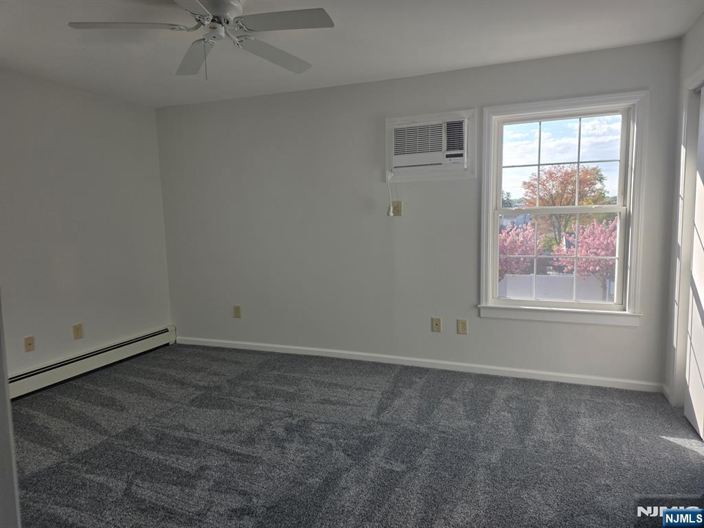 633 10th Street, Unit 2 Lyndhurst, NJ 07071 - Photo 7 of 11 an empty room with a window