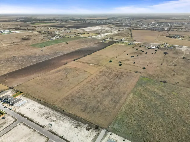 a view of a terrace with furniture and stove