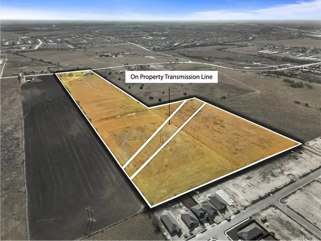 a view of a pool table and chairs
