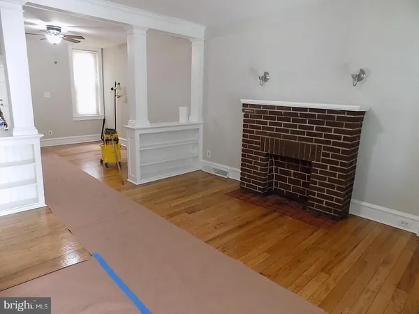 a view of livingroom with wooden floor