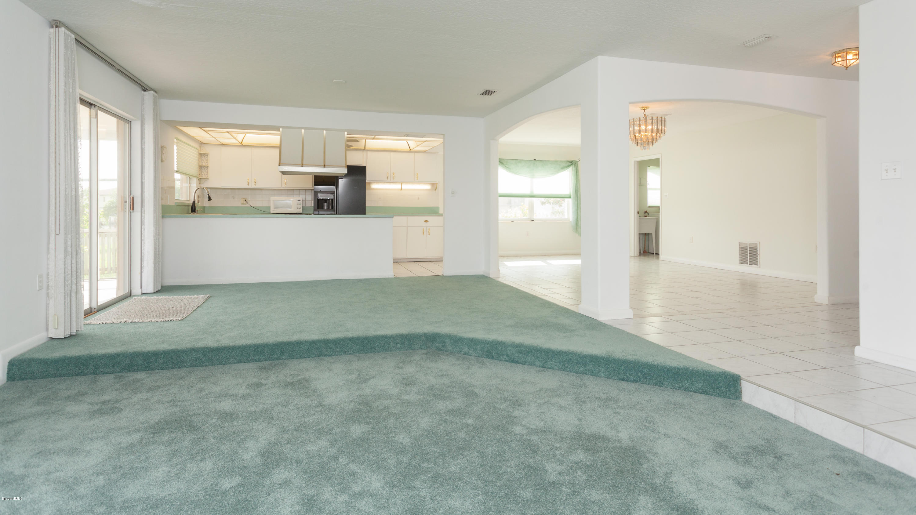 221 Bimini Road Cocoa Beach, FL 32931 - Photo 5 of 21 Open Living Space