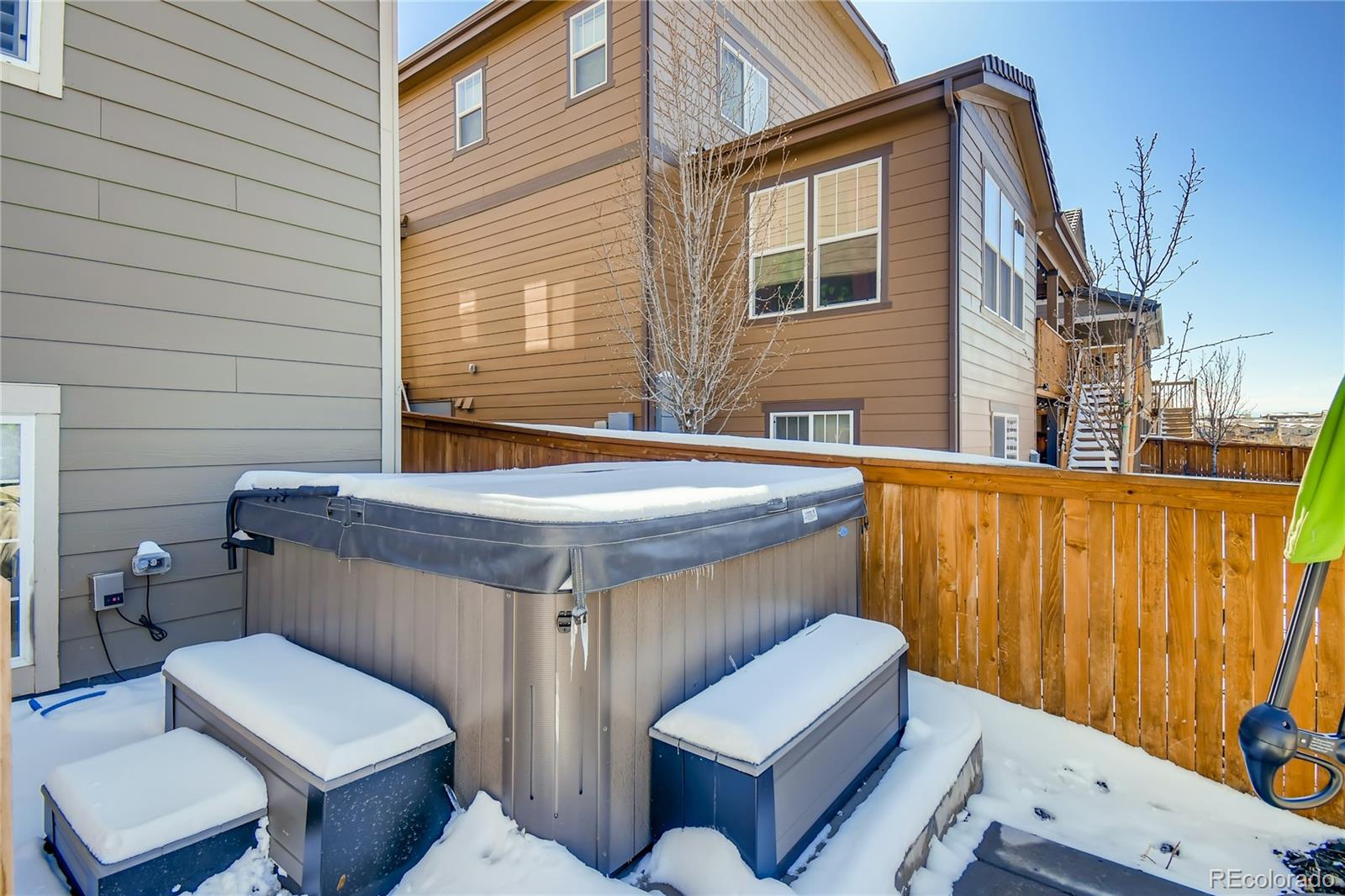 14402 Double Dutch Circle Parker, CO 80134 - Photo 26 of 31 a view of a patio with a table and chairs