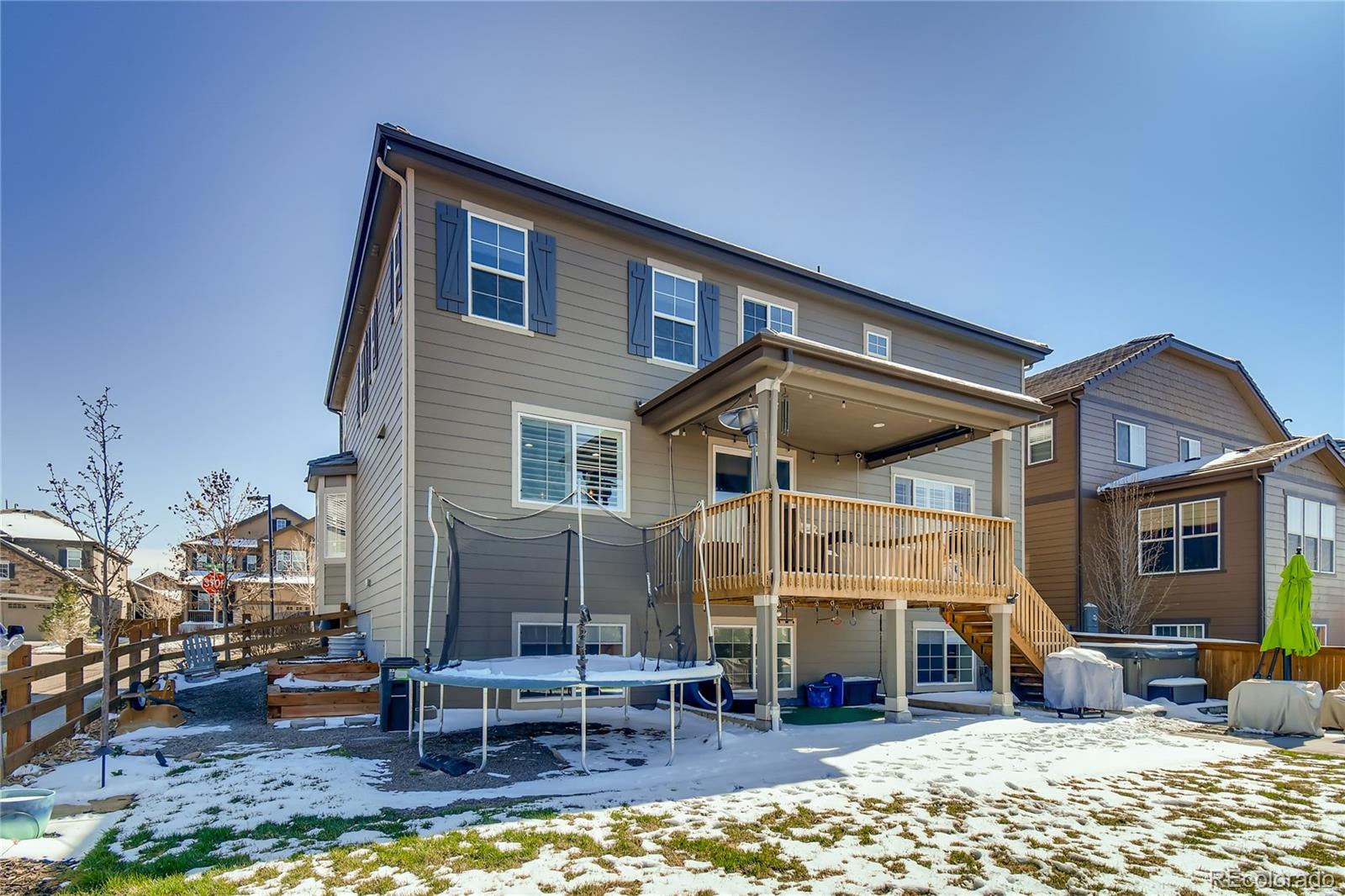 14402 Double Dutch Circle Parker, CO 80134 - Photo 27 of 31 a view of the house with swimming pool and sitting area