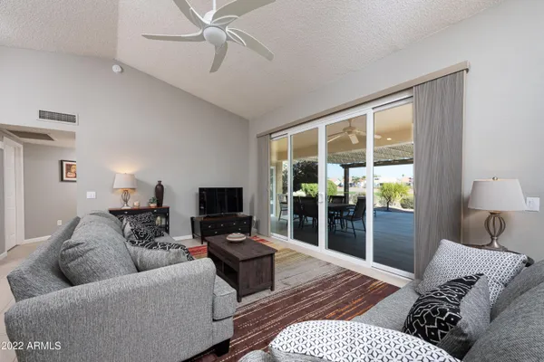 a living room with furniture and a window