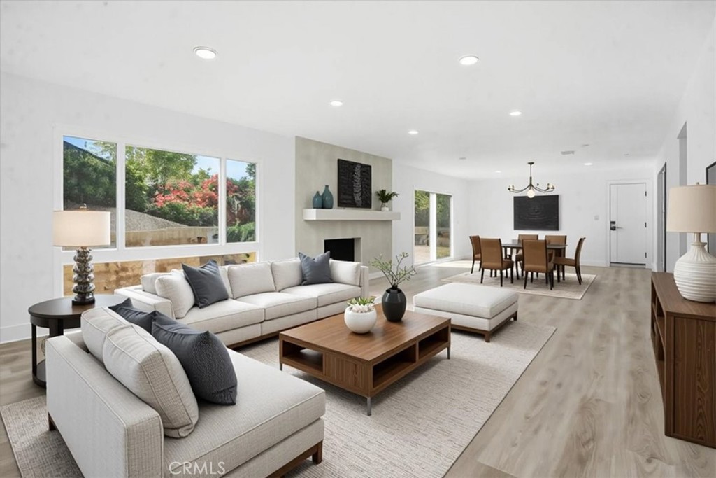 1410 Pleasant View Drive Redlands, CA 92374 - Photo 14 of 44 a living room with furniture fireplace and a large window
