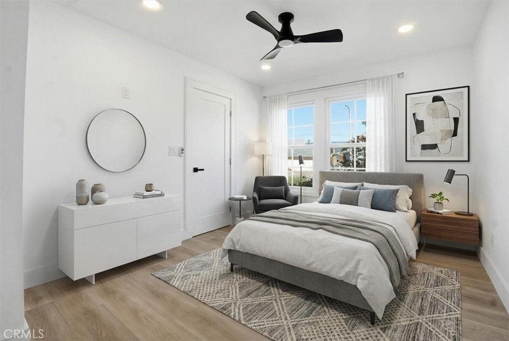 1410 Pleasant View Drive Redlands, CA 92374 - Photo 18 of 44 a bedroom with a bed and a chandelier