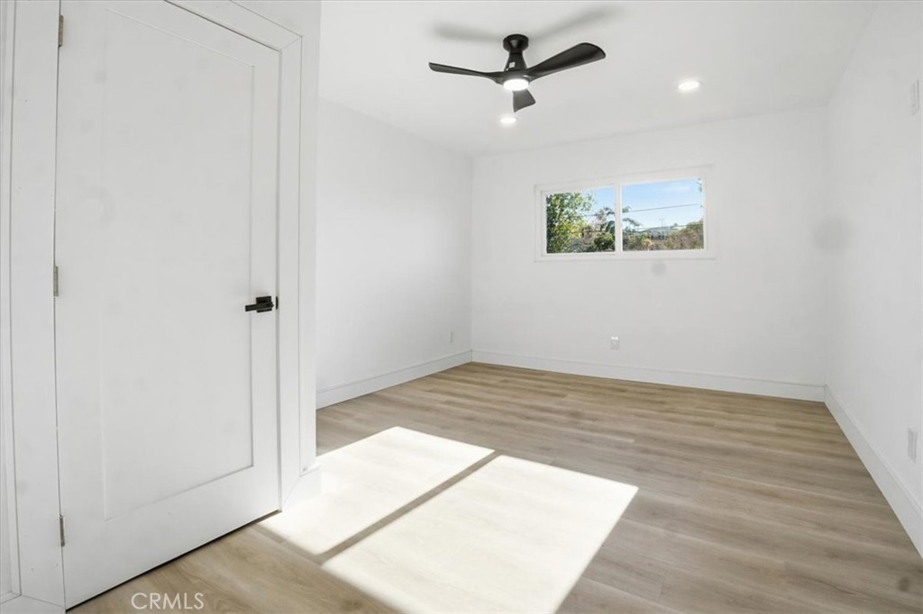 1410 Pleasant View Drive Redlands, CA 92374 - Photo 23 of 44 wooden floor in an empty room