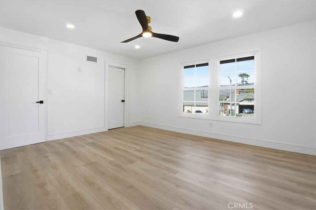 1410 Pleasant View Drive Redlands, CA 92374 - Photo 33 of 44 a view of an empty room with a window