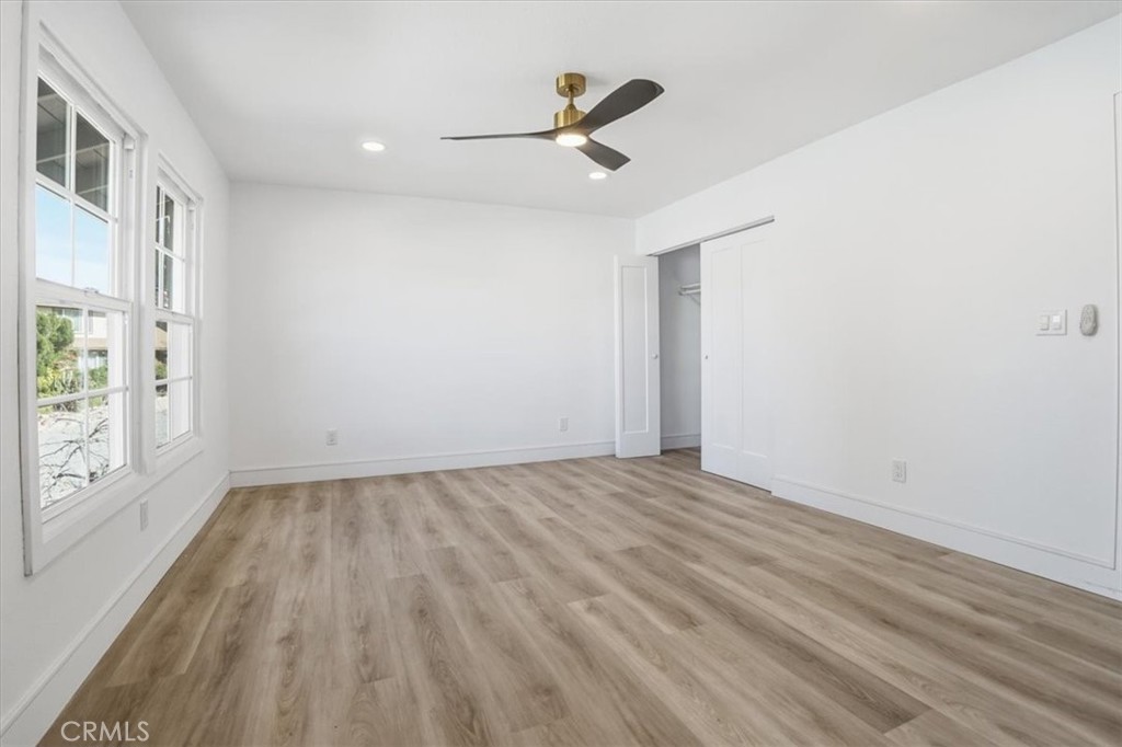 1410 Pleasant View Drive Redlands, CA 92374 - Photo 34 of 44 wooden floor in an empty room with a window