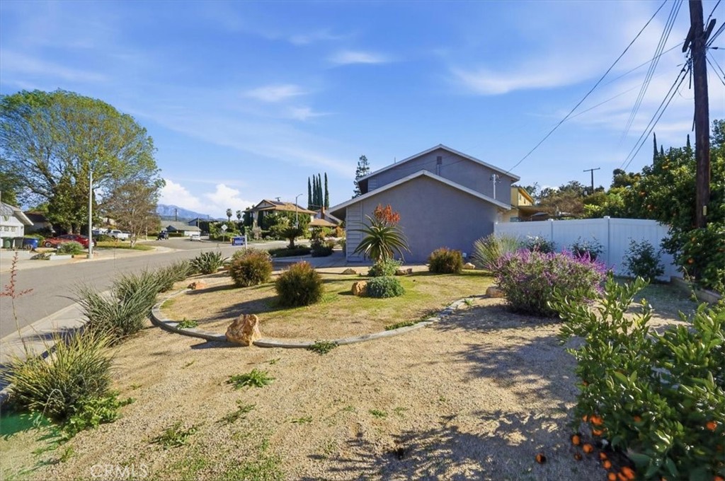 1410 Pleasant View Drive Redlands, CA 92374 - Photo 41 of 44 a view of a yard with cars