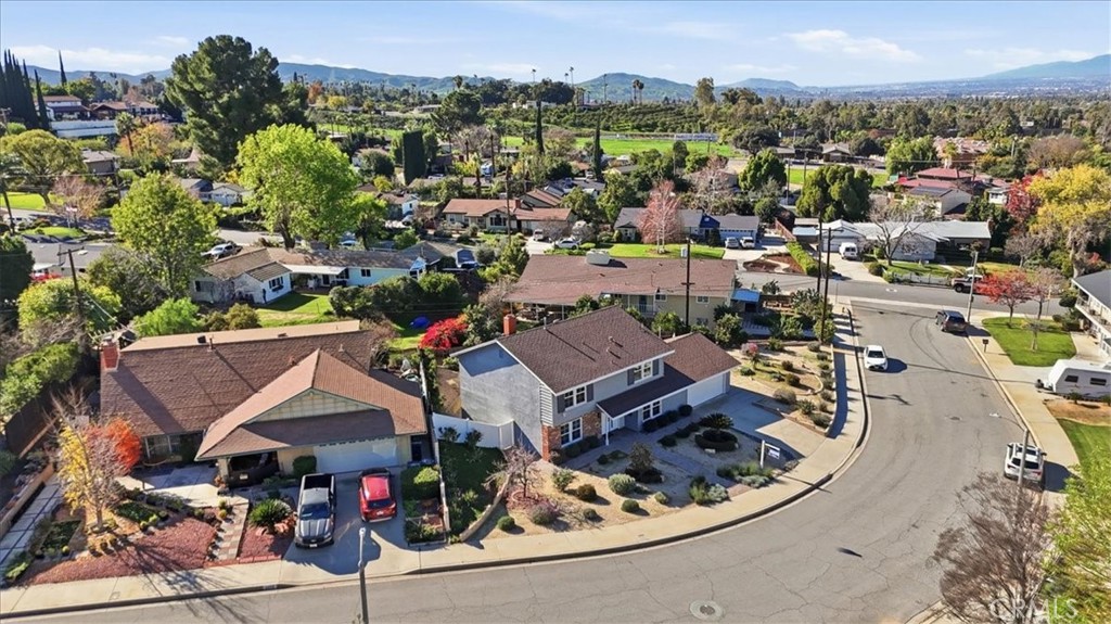 1410 Pleasant View Drive Redlands, CA 92374 - Photo 43 of 44 an aerial view of a houses with a swimming pool