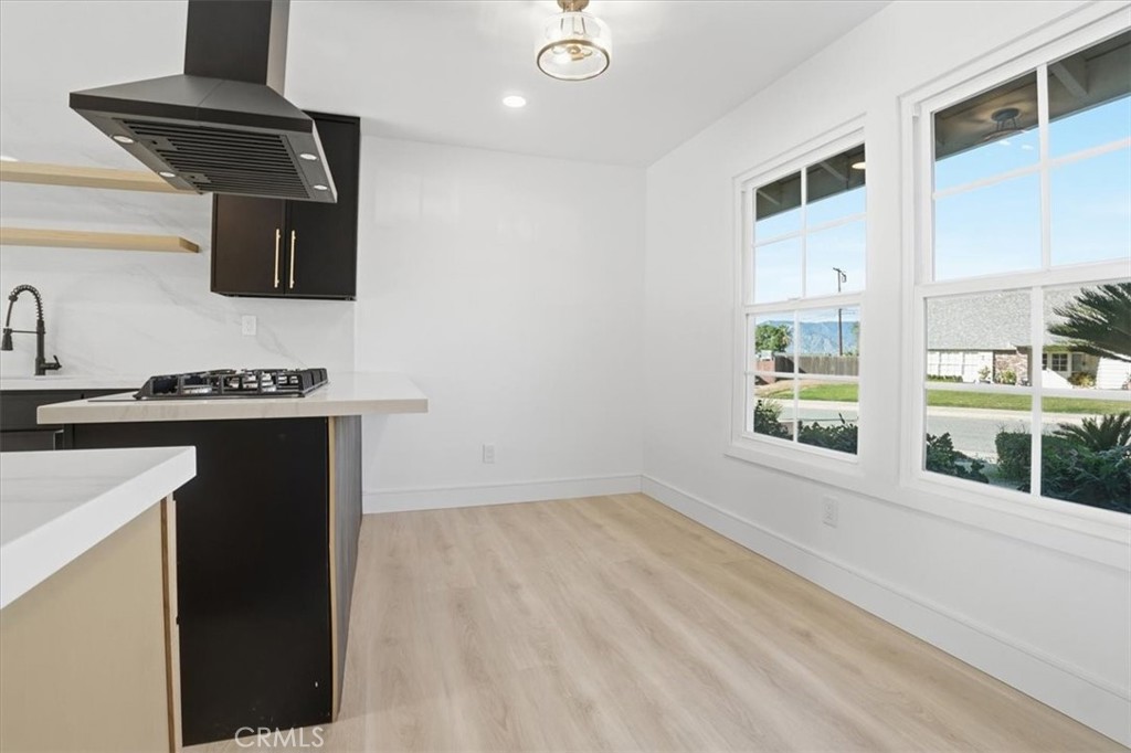 1410 Pleasant View Drive Redlands, CA 92374 - Photo 5 of 44 a kitchen with stainless steel appliances a sink a stove and a refrigerator