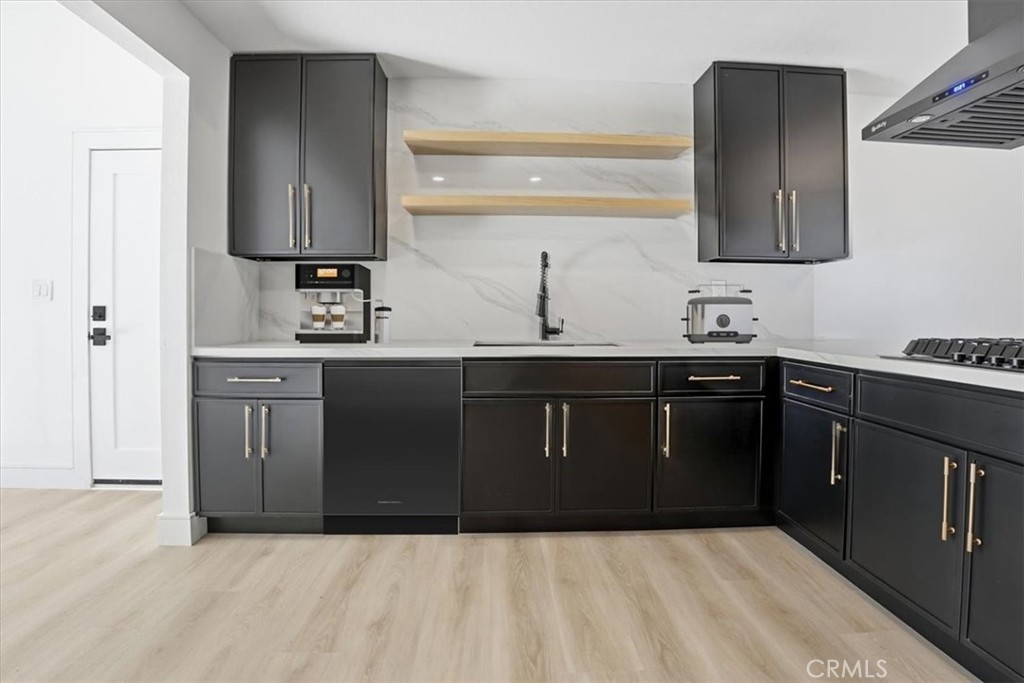 1410 Pleasant View Drive Redlands, CA 92374 - Photo 7 of 44 a kitchen with a sink and a stove