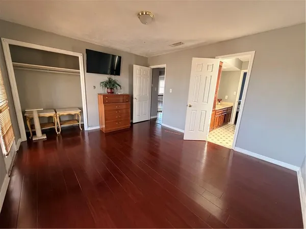 a view of livingroom with furniture and wooden floor