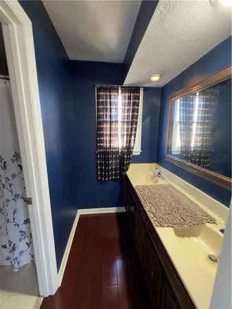 a view of entry way with wooden floor