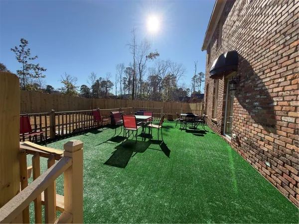 a view of a wooden deck and a porch