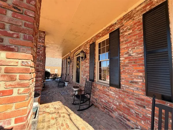 a view of a brick building with many windows