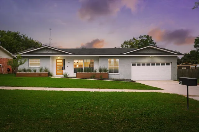 a view of kitchen with furniture and a potted plant