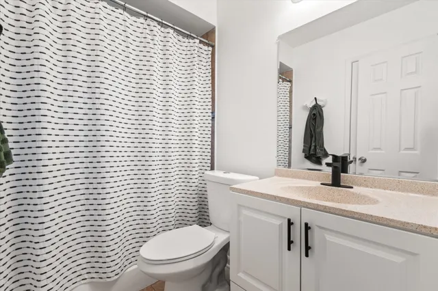 a view of a workspace with furniture