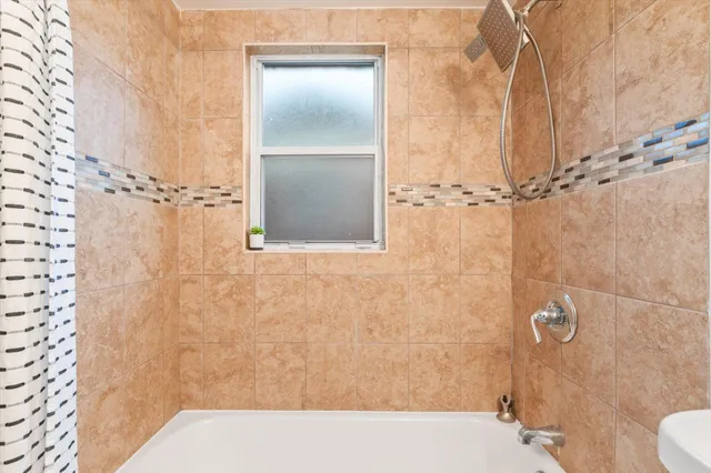 a bed room with a bed and a couch