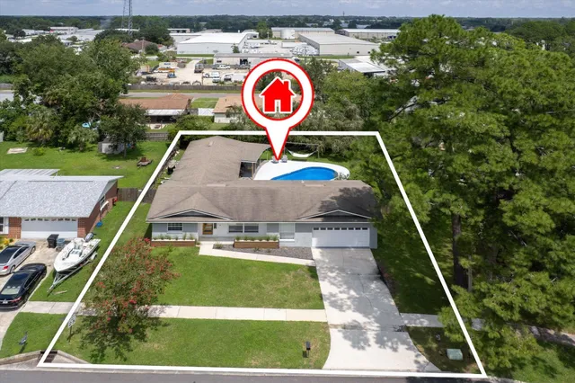 an aerial view of a house having yard