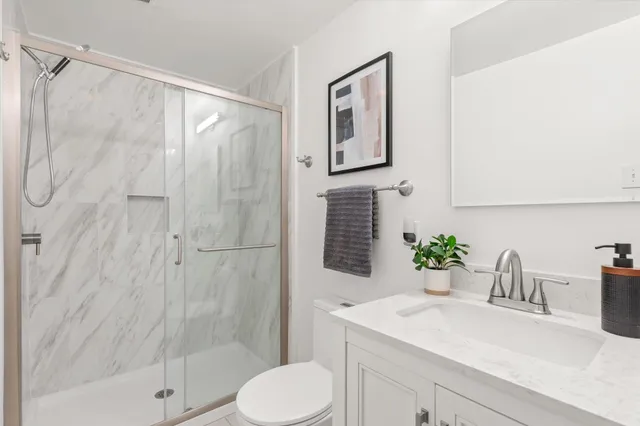 a view of a chairs and table in the backyard