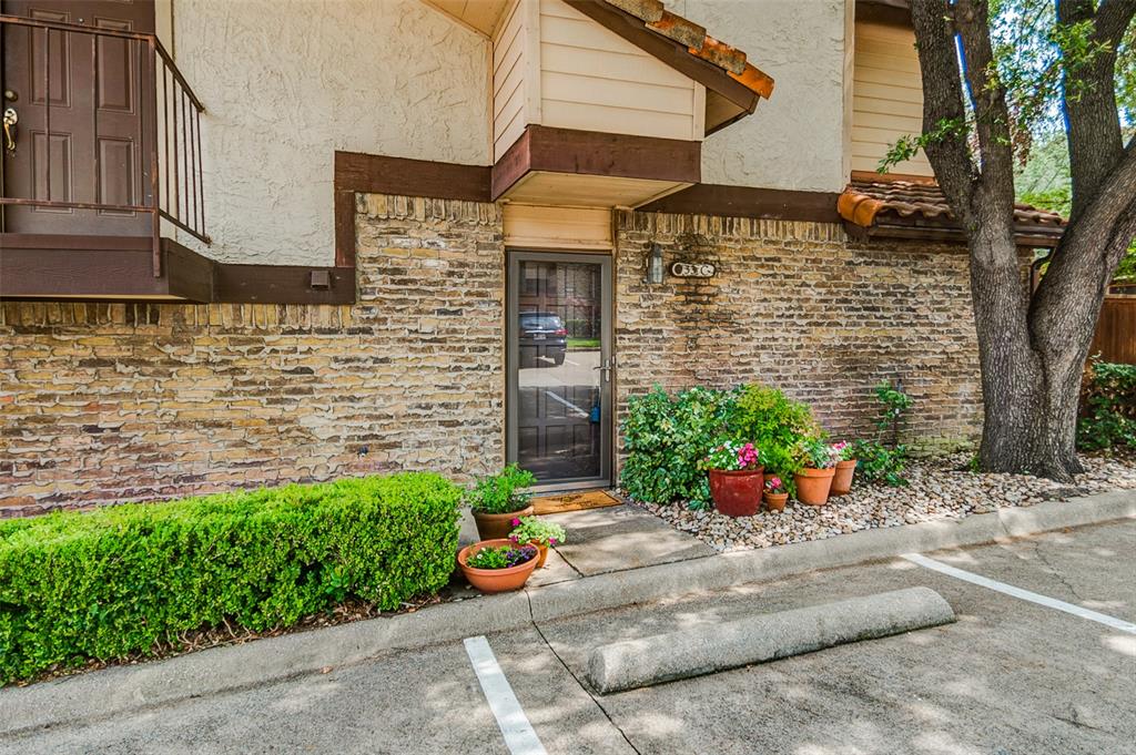 5626 Preston Oaks Road, Unit 33C Dallas, TX 75254 - Photo 1 of 1 a front view of a house with an empty space