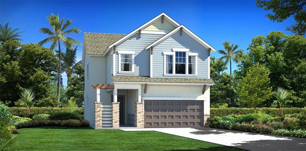 6912 Maker's Way Apollo Beach, FL 33572 - Photo 1 of 1 a front view of a house with a yard