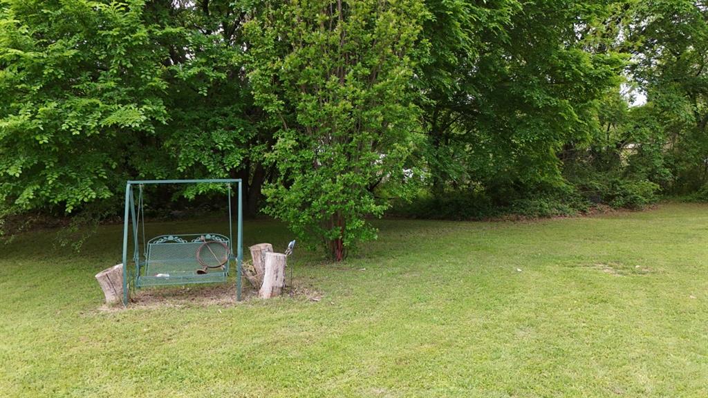 415 Meadowlark Trail Springtown, TX 76082 - Photo 28 of 35 a garden view with a lake view