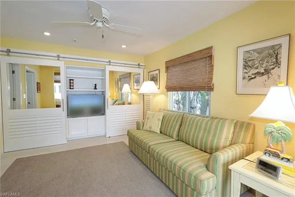 a living room with a couch and a couch