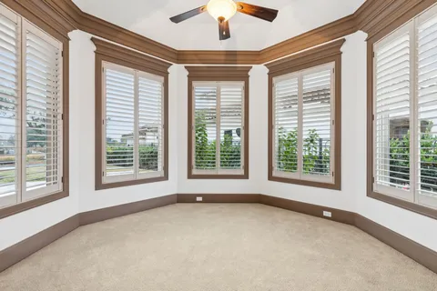 a bathroom with a bathtub and a mirror