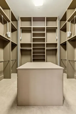 a view of storage and utility room with empty racks