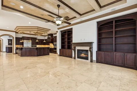 a view of a livingroom with furniture and a fireplace