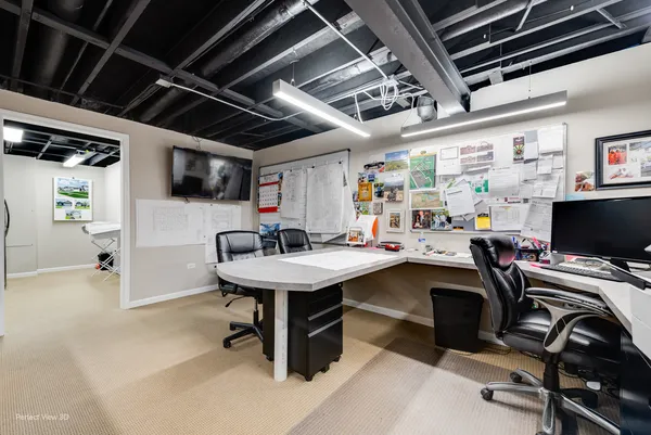 a utility room with cabinets dryer and washer