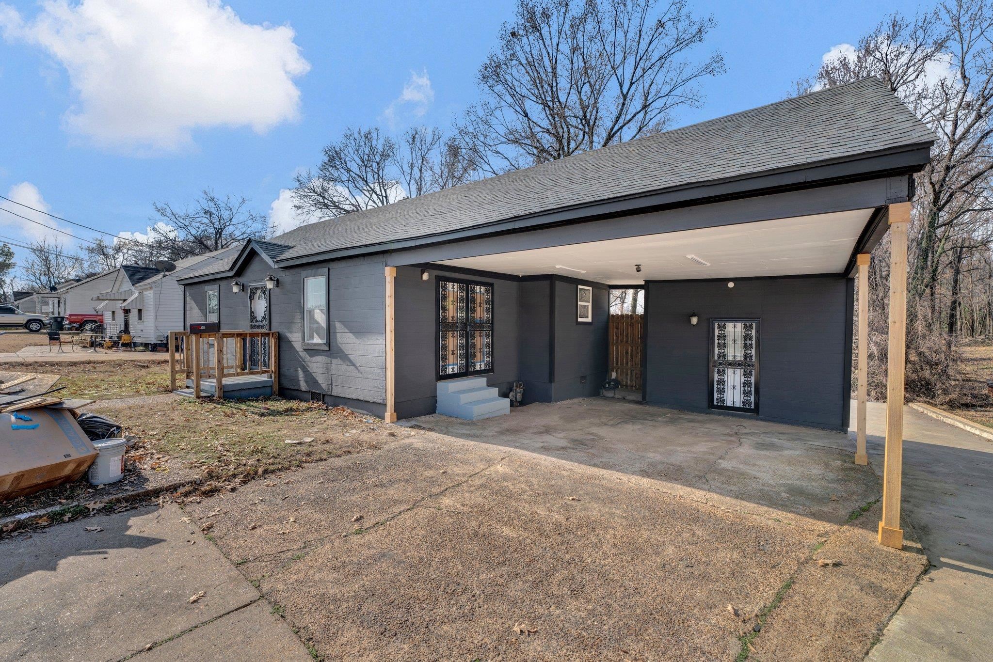 2161 Charjean Road Memphis, TN 38114 - Photo 2 of 18 View of front of house featuring a carport